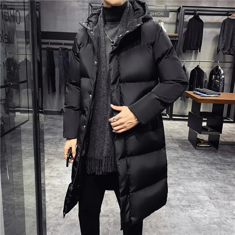 Damien | Manteau d'hiver long noir pour homme, rembourré et imperméable avec capuche et poches latérales